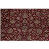 Image 4 : A WOOL HAND KNOTTED FLORAL ORIENTAL AREA RUG.