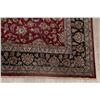 Image 6 : A WOOL HAND KNOTTED FLORAL ORIENTAL AREA RUG.