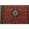 Image 4 : A WOOL HAND KNOTTED FLORAL MEDALLION AREA RUG.