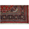 Image 6 : A WOOL HAND KNOTTED FLORAL MEDALLION AREA RUG.