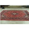 Image 9 : A WOOL HAND KNOTTED FLORAL MEDALLION AREA RUG.
