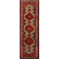 A WOOL HAND KNOTTED ARDEBIL RUG RUNNER.