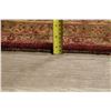 Image 11 : A WOOL HAND KNOTTED FLORAL ORIENTAL AREA RUG.