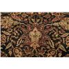 Image 12 : A WOOL HAND KNOTTED FLORAL ORIENTAL AREA RUG.