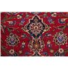 Image 12 : A WOOL HAND KNOTTED FLORAL ORIENTAL AREA RUG.
