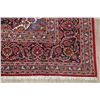 Image 5 : A WOOL HAND KNOTTED FLORAL ORIENTAL AREA RUG.