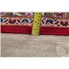 Image 9 : A WOOL HAND KNOTTED FLORAL ORIENTAL AREA RUG.