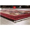 Image 10 : A WOOL HAND KNOTTED BALOUCH AREA RUG.