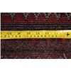 Image 12 : A WOOL HAND KNOTTED BALOUCH AREA RUG.