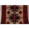 Image 4 : A WOOL HAND KNOTTED BALOUCH AREA RUG.