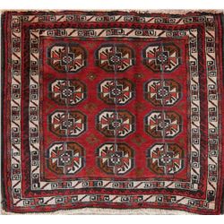 A WOOL HAND KNOTTED BALOUCH ORIENTAL AREA RUG.