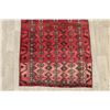 Image 5 : A WOOL HAND KNOTTED BALOUCH ORIENTAL AREA RUG.