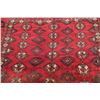 Image 9 : A WOOL HAND KNOTTED BALOUCH ORIENTAL AREA RUG.
