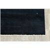 Image 6 : A WOOL HAND KNOTTED GABBEH RUG.