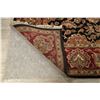 Image 10 : A WOOL HAND KNOTTED FLORAL ORIENTAL AREA RUG.
