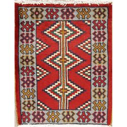 A WOOL HAND KNOTTED MALAYER ORIENTAL RUG.