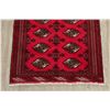 Image 5 : A WOOL HAND KNOTTED BALOUCH ORIENTAL AREA RUG.