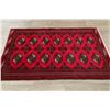 Image 9 : A WOOL HAND KNOTTED BALOUCH ORIENTAL AREA RUG.