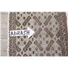 Image 12 : A WOOL HAND KNOTTED BALOUCH AREA RUG.