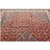 Image 12 : A WOOL HAND KNOTTED MEDALLION AREA RUG.
