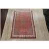 Image 2 : A WOOL HAND KNOTTED MEDALLION AREA RUG.