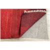 Image 10 : A WOOL HAND KNOTTED GABBEH AREA RUG.