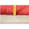 Image 11 : A WOOL HAND KNOTTED GABBEH AREA RUG.