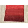 Image 5 : A WOOL HAND KNOTTED GABBEH AREA RUG.