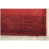 Image 6 : A WOOL HAND KNOTTED GABBEH AREA RUG.