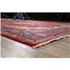 Image 11 : A WOOL HAND KNOTTED FLORAL ORIENTAL AREA RUG.