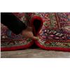 Image 12 : A WOOL HAND KNOTTED FLORAL ORIENTAL AREA RUG.
