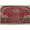 Image 9 : A WOOL HAND KNOTTED FLORAL ORIENTAL AREA RUG.