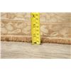 Image 11 : A WOOL HAND KNOTTED ORIENTAL AREA RUG.