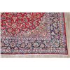 Image 6 : A WOOL HAND KNOTTED FLORAL ORIENTAL AREA RUG.