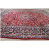 Image 9 : A WOOL HAND KNOTTED FLORAL ORIENTAL AREA RUG.