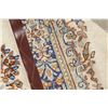 Image 10 : A WOOL HAND KNOTTED FLORAL MEDALLION AREA RUG.