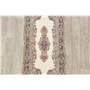 Image 12 : A WOOL HAND KNOTTED FLORAL MEDALLION AREA RUG.