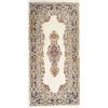 Image 1 : A WOOL HAND KNOTTED FLORAL MEDALLION AREA RUG.