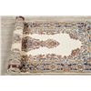 Image 6 : A WOOL HAND KNOTTED FLORAL MEDALLION AREA RUG.