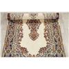 Image 8 : A WOOL HAND KNOTTED FLORAL MEDALLION AREA RUG.