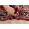 Image 12 : A WOOL HAND KNOTTED ORIENTAL AREA RUG.