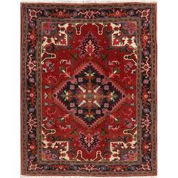 A WOOL HAND KNOTTED ORIENTAL AREA RUG.