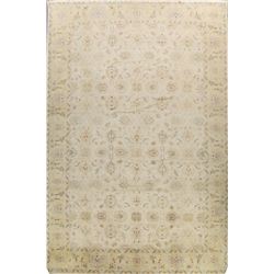 A WOOL HAND KNOTTED OUSHAK ORIENTAL AREA RUG.