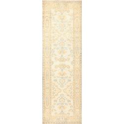 A WOOL HAND KNOTTED TURKISH AREA RUG.