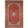 Image 1 : A WOOL HAND KNOTTED FLORAL AREA RUG.