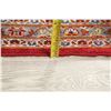 Image 7 : A WOOL HAND KNOTTED FLORAL AREA RUG.