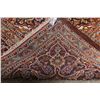 Image 8 : A WOOL HAND KNOTTED FLORAL AREA RUG.