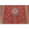 Image 9 : A WOOL HAND KNOTTED FLORAL AREA RUG.