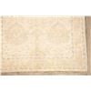 Image 6 : A WOOL HAND KNOTTED TURKISH AREA RUG.