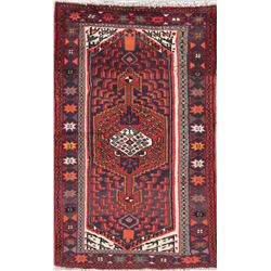 A WOOL HAND KNOTTED MALAYER ORIENTAL RUG.